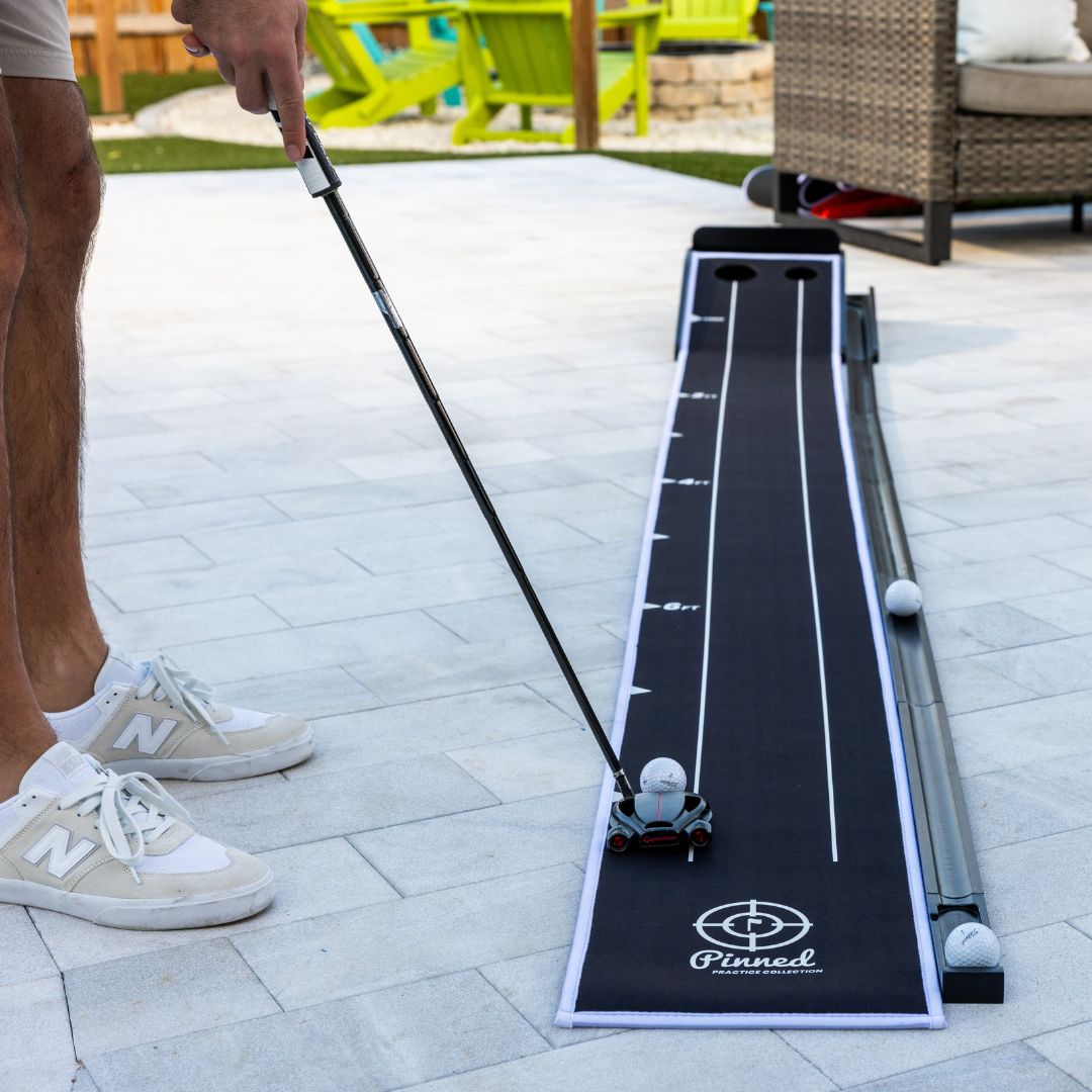 The Roller Putting Mat with Ball Return
